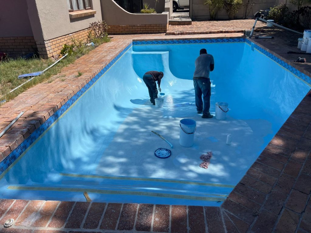 Aquatic Pools team relining a swimming pool