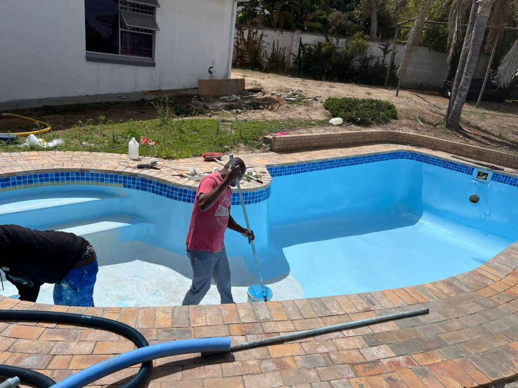Aquatic Pools team relining a swimming pool