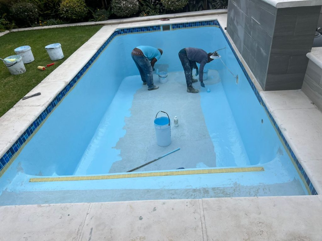 Aquatic Pools team relining a swimming pool