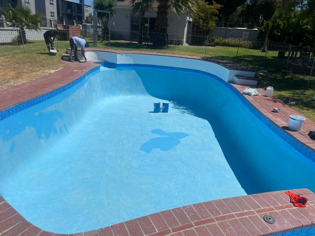 Renovated blue pool, the finish we aim for with pool renovations in St James