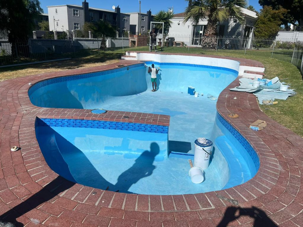 Aquatic Pools team relining a swimming pool