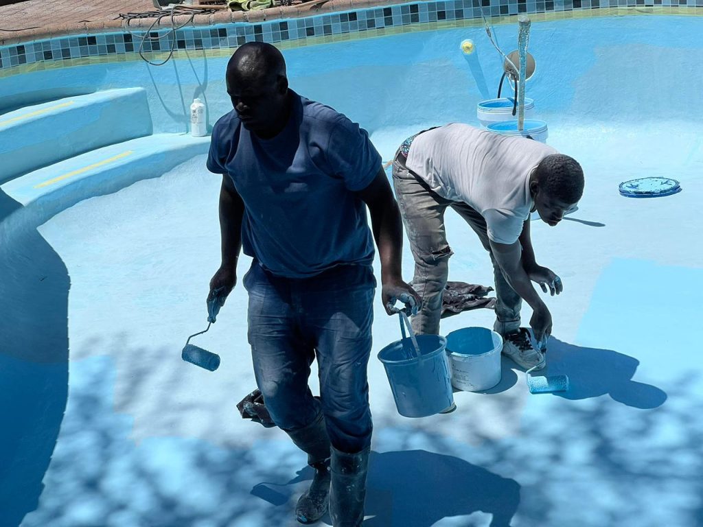 Aquatic Pools team relining a swimming pool
