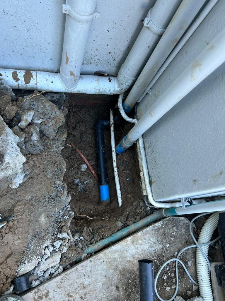 Underground pool pipe repair after a leak was found