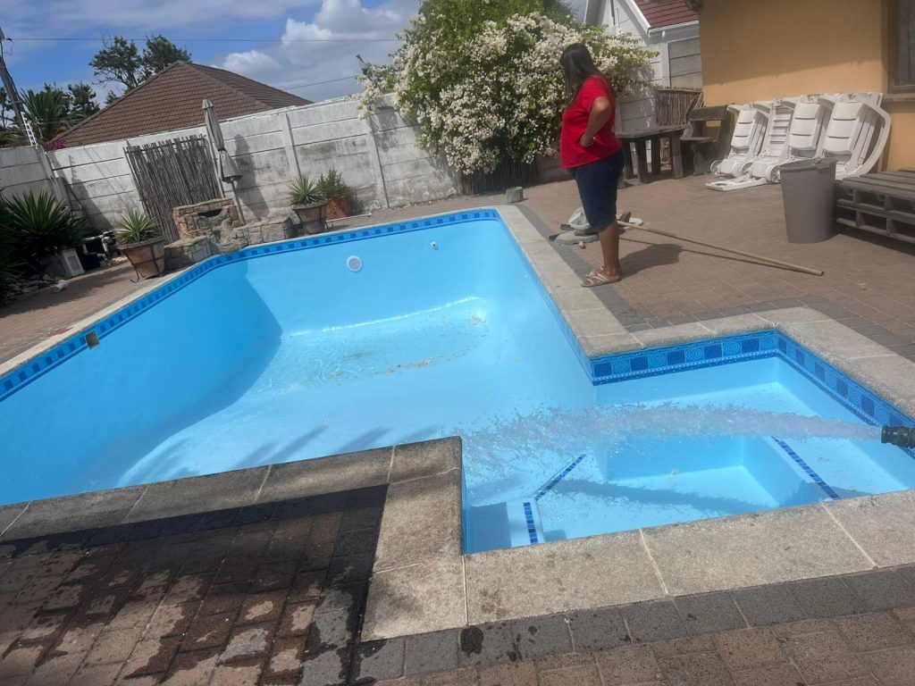 Crack repairs and surface preparation during a pool renovation