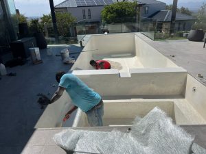 Aquatic Pools team completing a fibreglass pool relining in Cape Town