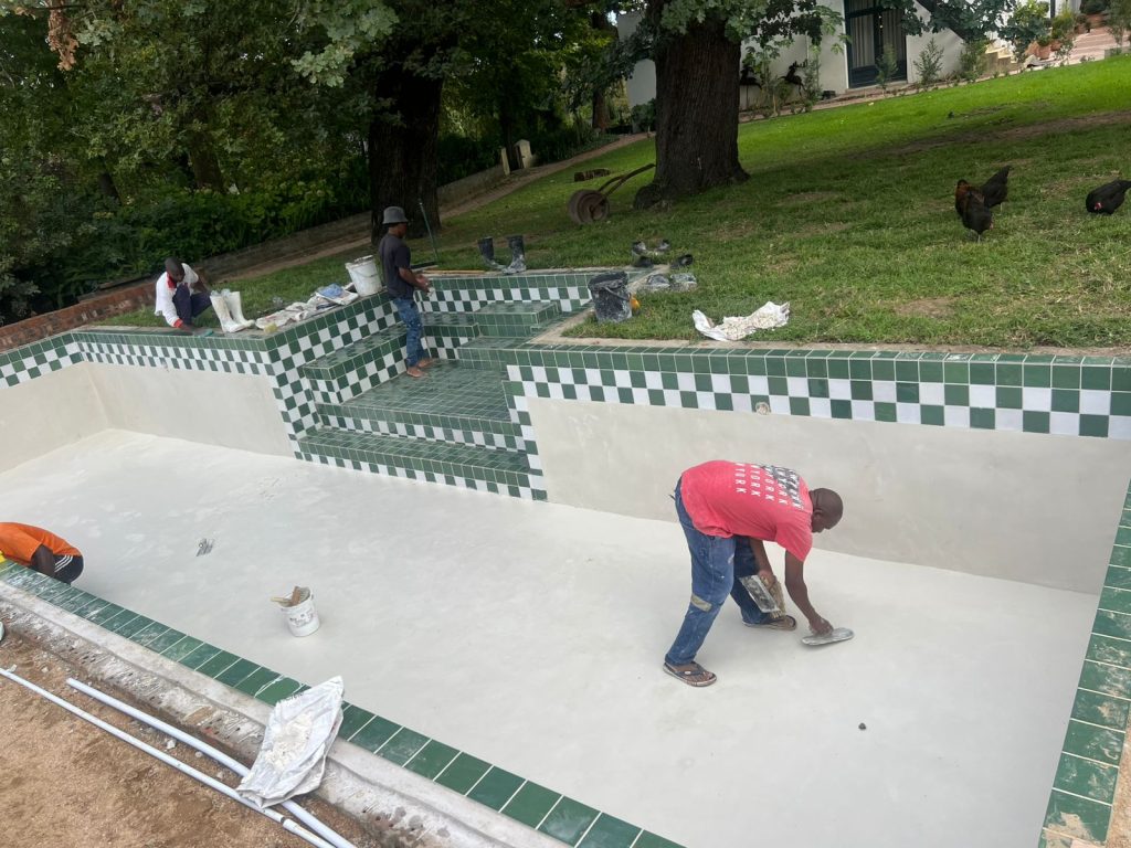 Aquatic Pools team relining a swimming pool