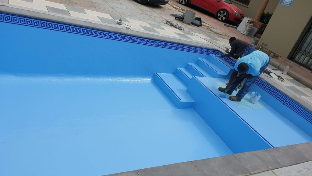 Fibreglass pool lining being applied during a conversion in Cape Town